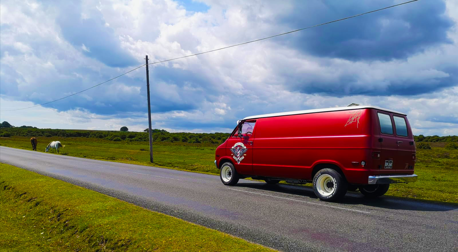 Red Camper Van On The Road Christchurch